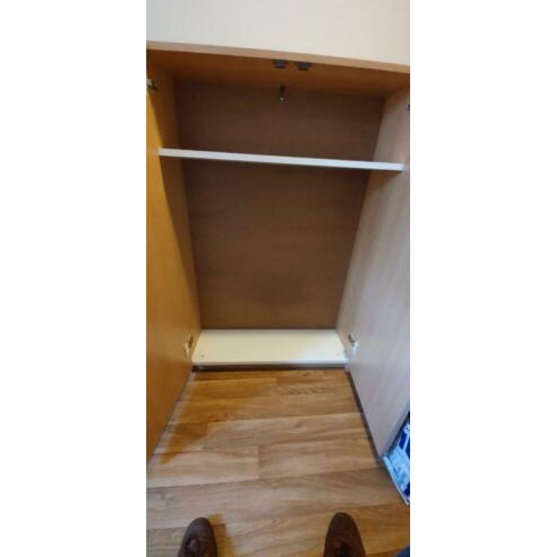 Cupboard with a a single shelf. 122*65*28 cm