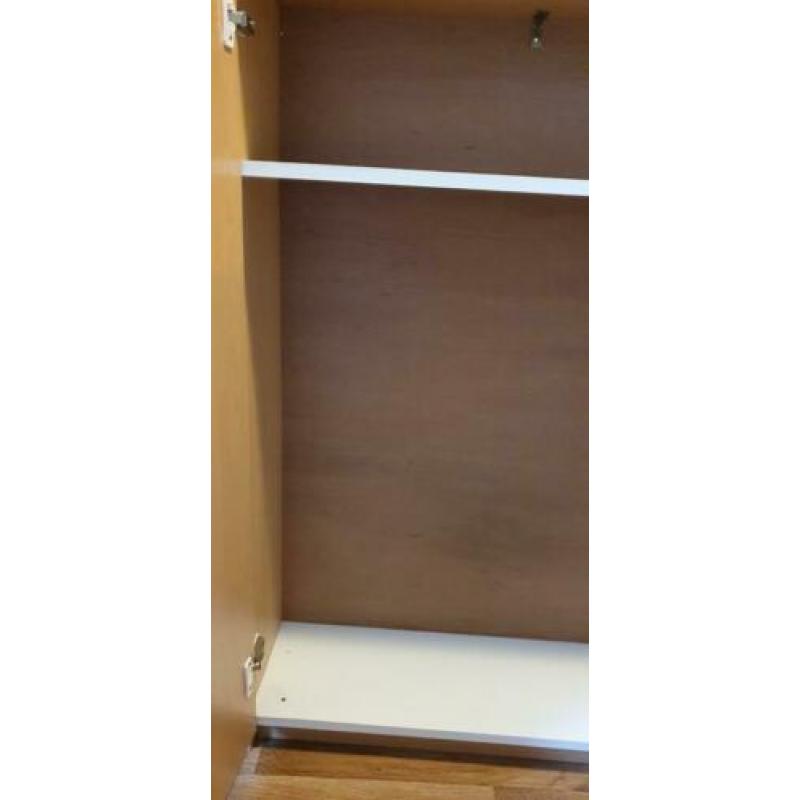 Cupboard with a a single shelf. 122*65*28 cm
