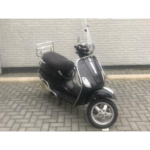 Vespa S blauw kenteken