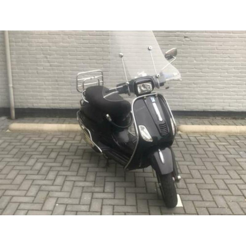 Vespa S blauw kenteken