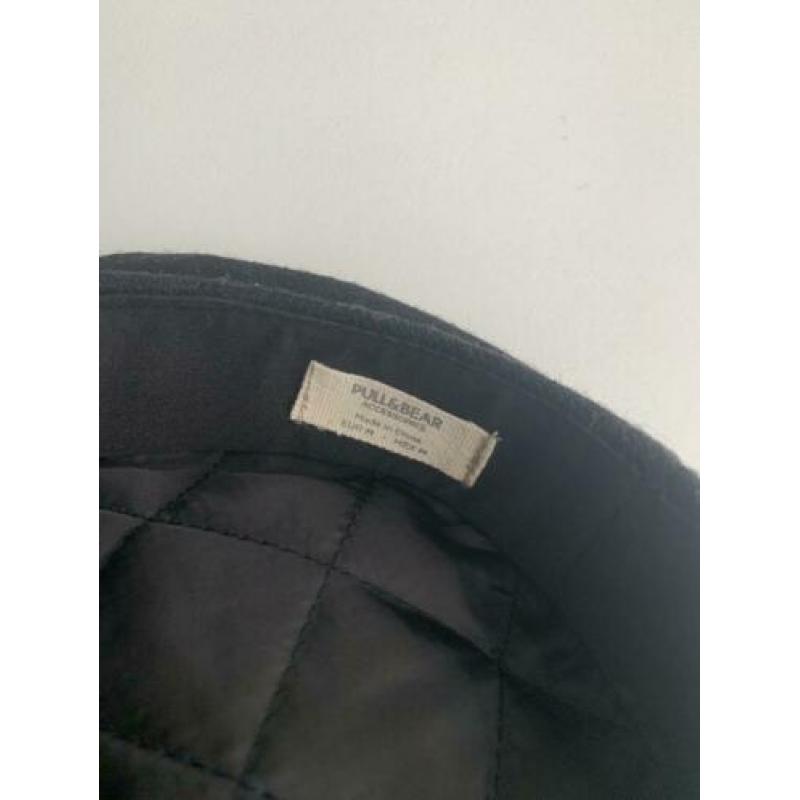 Nieuwe schipperspet van pull and bear