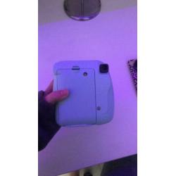 Een mooie licht blauw instax mini 9