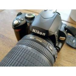 Nikon D60 met lens 18-105