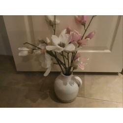 5,00 euro op te halen vaas met bloemen