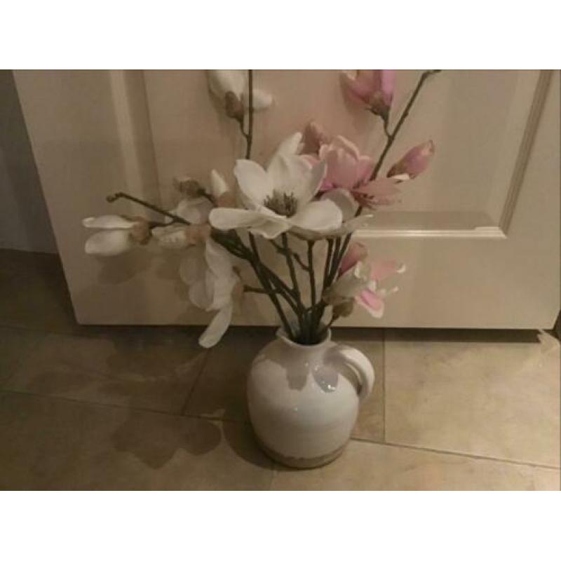 5,00 euro op te halen vaas met bloemen