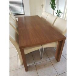 Supermooie eethoek met 6 lederen stoelen