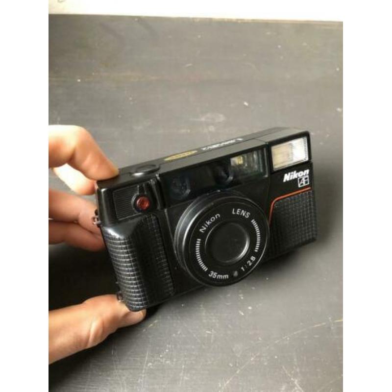 Nikon L35 AF2 point & shoot camera (stuck shutterbutton)