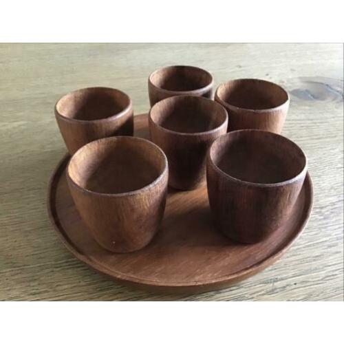 Vintage “houten eierdopjes met bijbehorend plateau”
