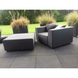 Luxe loungestoel met hocker