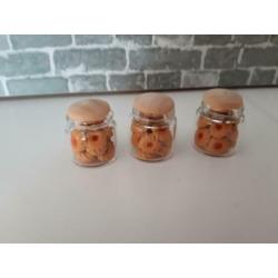 Glazen pot met jamkoekjes