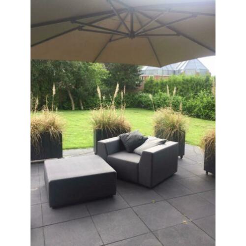 Luxe loungestoel met hocker