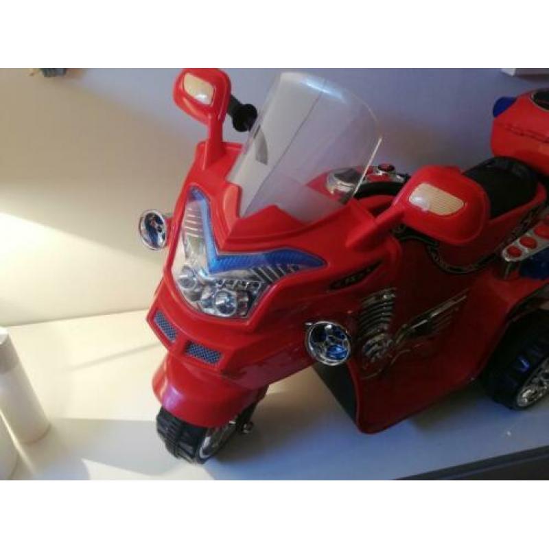 Electrische kinder motorfiets plastic 90 x 50 cm werking???