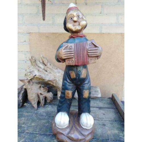 Accordionist. Houtsnijwerk, 525 mm groot.