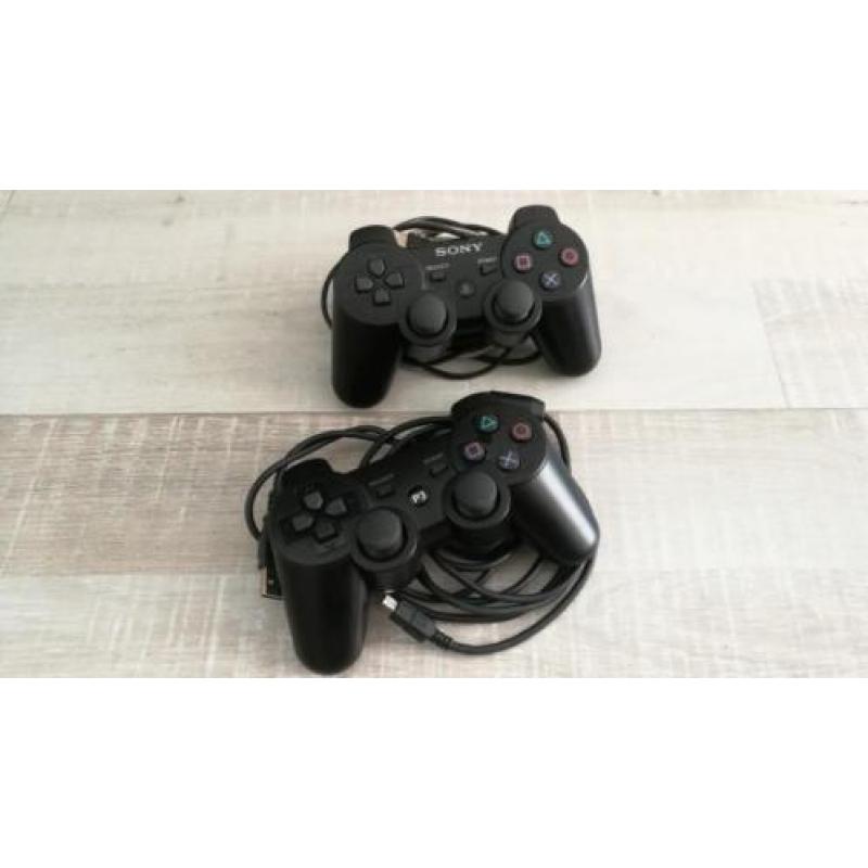 PS3 z.g.a.n. met spellen, controllers en veel extra's!!